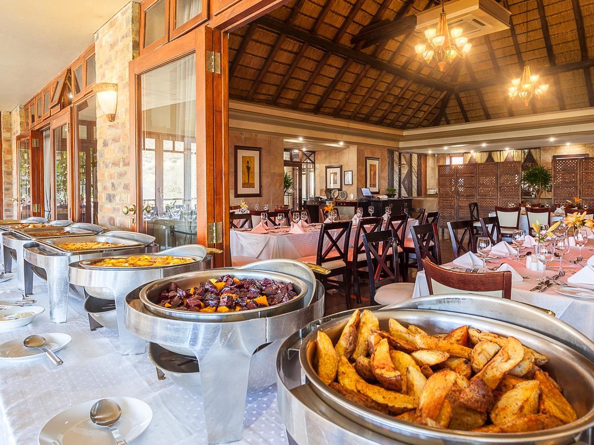 Kloofzicht Lodge & Spa Крюгерсдорп Экстерьер фото A buffet at a hotel